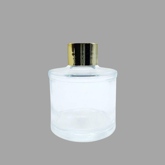 Glasflasche mit goldenem Ornamentverschluss