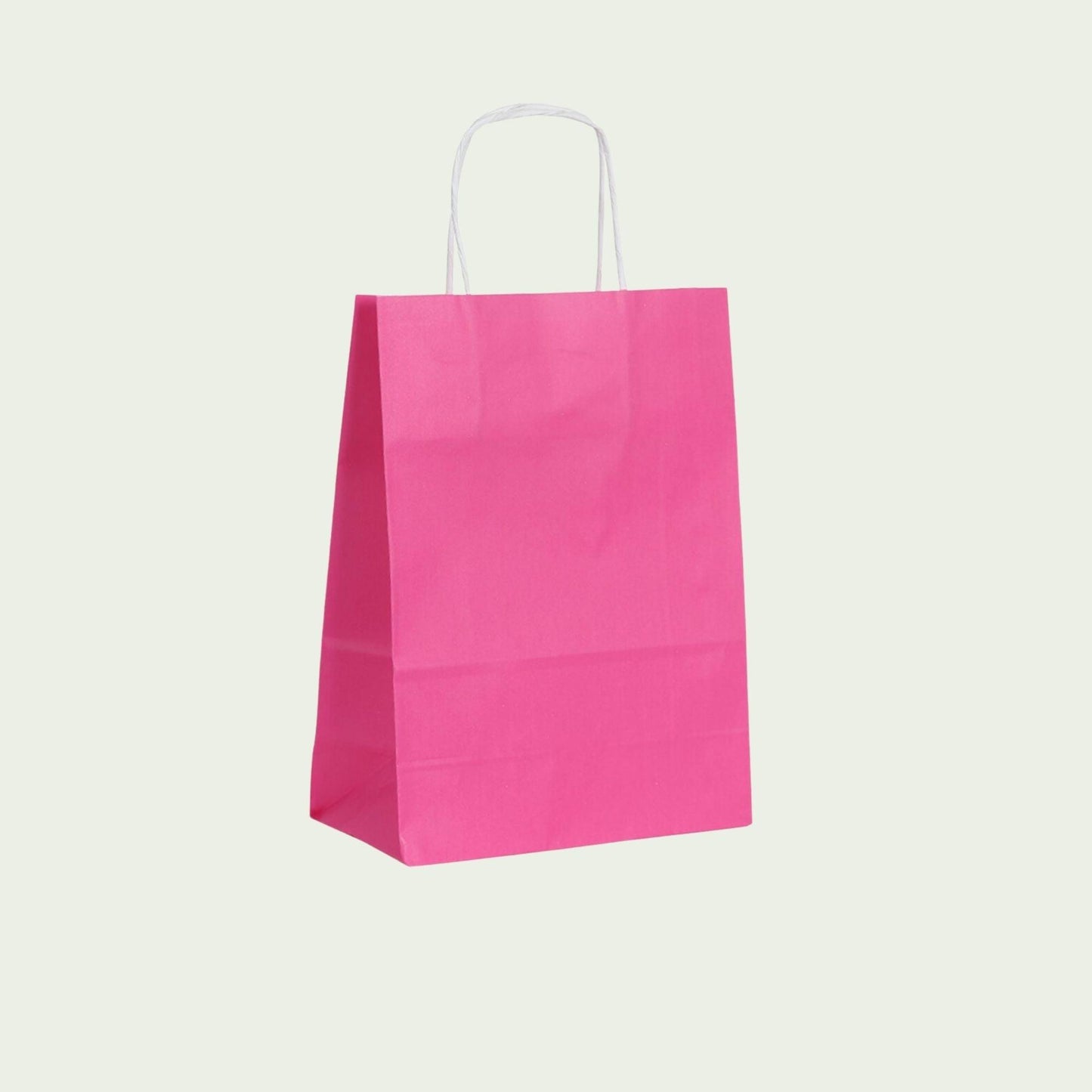 Pinkfarbene Papiertüte mit Henkel