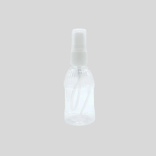 Kleine Glasflasche mit Sprühaufsatz