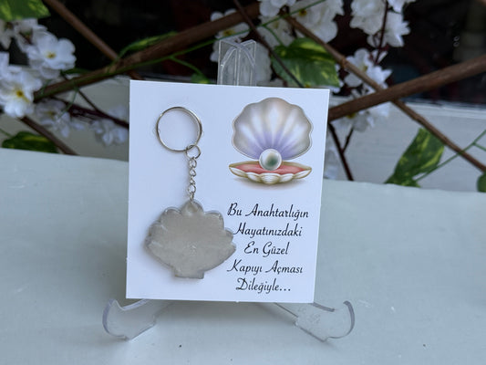 Gastgeschenk Set Epoxidharz-Muschelschlüsselanhänger mit Karte (für 50 Gäste)